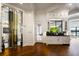 Refined dining area featuring a glass-enclosed wine storage and a butler's pantry at 570 Manor Rd, Maitland, FL 32751