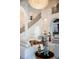 Bright foyer featuring a grand staircase with black railings and a view of the spacious living area at 570 Manor Rd, Maitland, FL 32751