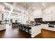 Spacious open-concept kitchen with large island, custom cabinets, and marble countertops at 570 Manor Rd, Maitland, FL 32751