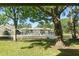 Scenic view of a community pool, highlighting its appealing waterfront location at 5961 Windhover Dr # F05, Orlando, FL 32819