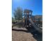 Community playground featuring two slides, climbing structures, and a secure, -friendly design at 604 Sarner Pass Way, Winter Haven, FL 33881