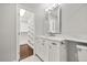 This bathroom features a walk in closet, natural light and single sink vanity at 640 Killarney Bay Ct # 4, Winter Park, FL 32789