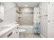 This bathroom features a shower-tub combo and single sink vanity at 640 Killarney Bay Ct # 4, Winter Park, FL 32789