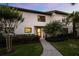 Charming two-story condo featuring well-maintained landscaping, mature trees, and a welcoming entrance at 640 Killarney Bay Ct # 4, Winter Park, FL 32789