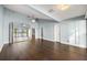 The main bedroom boasts an ensuite bath, hardwood floors and an expansive view of the lake at 640 Killarney Bay Ct # 4, Winter Park, FL 32789