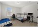 A bedroom featuring a bed, bunk beds, desks, and chairs, perfect for a shared space at 7409 Inlet Pt, Celebration, FL 34747
