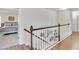 Bright hallway with wood floors and staircase at 7545 Azalea Cove Cir, Orlando, FL 32807