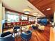 Elegant bar lounge area with comfortable seating, stylish decor, and a relaxed ambiance at 8001 Sand Bar Dr, Kissimmee, FL 34747