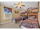 Themed bedroom featuring bunk beds, mural of a castle on the wall, and ornate bedding at 8160 Sun Palm Dr, Kissimmee, FL 34747
