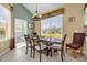 Charming dining room with natural light and view to the front yard at 8160 Sun Palm Dr, Kissimmee, FL 34747
