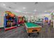 Includes a Jurassic Park arcade game, pool table, and ping pong for entertainment at 8160 Sun Palm Dr, Kissimmee, FL 34747