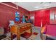 Game room showcases foosball table and an arcade game with a Disney themed poster at 8160 Sun Palm Dr, Kissimmee, FL 34747
