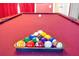 Close up on the pool table showing the rack of pool balls at 8160 Sun Palm Dr, Kissimmee, FL 34747