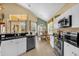 Bright kitchen with stainless steel appliances and an eat-in dining area with outside view at 8160 Sun Palm Dr, Kissimmee, FL 34747