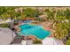 Resort-style pool area with a splash pad, hot tub, and ample lounging space at 8160 Sun Palm Dr, Kissimmee, FL 34747