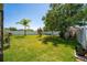 Well-maintained backyard is enclosed by a white fence at 8856 Hastings Beach Blvd, Orlando, FL 32829