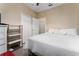 Inviting bedroom with a queen-size bed, closet, and practical furnishings at 8856 Hastings Beach Blvd, Orlando, FL 32829