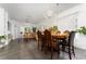 Open-concept dining area with a chandelier and neutral tones, great for entertaining at 8856 Hastings Beach Blvd, Orlando, FL 32829