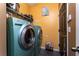 Laundry room features side-by-side washer and dryer at 8856 Hastings Beach Blvd, Orlando, FL 32829