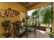 Screened porch features tile flooring, and views of the backyard at 8856 Hastings Beach Blvd, Orlando, FL 32829