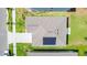 Birds eye view of a home showcasing the roof and solar panels at 917 Jackson Ave, Davenport, FL 33837