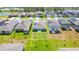 A new home community with solar panels on the roofs of each house at 917 Jackson Ave, Davenport, FL 33837