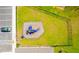 Overhead view of a community playground including a blue slide at 917 Jackson Ave, Davenport, FL 33837