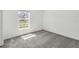 Bedroom with carpet, window and natural light at 917 Jackson Ave, Davenport, FL 33837
