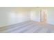 Carpeted bedroom featuring access to both a walk-in closet and an ensuite bathroom at 917 Jackson Ave, Davenport, FL 33837