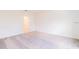 This bedroom features neutral carpet, white walls, and ample natural light at 921 Jackson Ave, Davenport, FL 33837