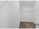Walk-in closet fitted with white wire shelving for optimal organization and storage at 921 Jackson Ave, Davenport, FL 33837