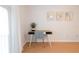 Stylish desk with a gray chair, perfect for a productive workspace in a well-lit room at 935 Amy Ridge Ct, Kissimmee, FL 34747
