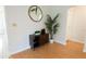 Hallway featuring dark wood cabinet, decor and mirror at 935 Amy Ridge Ct, Kissimmee, FL 34747