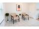 Comfortable sitting room with two modern chairs and a decorative side table, perfect for relaxing at 935 Amy Ridge Ct, Kissimmee, FL 34747