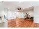 Spacious upstairs bonus room with hardwood floors, ample storage, and access to multiple rooms at 9963 Hartford Maroon Rd, Orlando, FL 32827