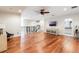 Open upstairs bonus room featuring hardwood floors, ample space, and plenty of natural light at 9963 Hartford Maroon Rd, Orlando, FL 32827
