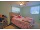 Bright bedroom with a fan and filled with natural light at 1 Cosmos Dr, Orlando, FL 32807