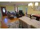Spacious living area featuring hardwood floors and lots of natural light, perfect for entertaining and comfortable living at 1 Cosmos Dr, Orlando, FL 32807