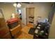 Bright office featuring a closet, desk, and hardwood floors at 1 Cosmos Dr, Orlando, FL 32807
