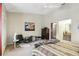 Relaxing main bedroom featuring vaulted ceilings, contemporary furniture, and an attached bathroom at 1005 Love Ln # 25, Apopka, FL 32703