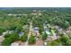 A neighborhood aerial view shows mature tree coverage with the property marked by a pin at 1046 Blackwood St, Altamonte Springs, FL 32701