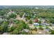 A neighborhood aerial view shows mature tree coverage with the property marked by a pin at 1046 Blackwood St, Altamonte Springs, FL 32701