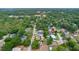 A neighborhood aerial view shows mature tree coverage with the property marked by a pin at 1046 Blackwood St, Altamonte Springs, FL 32701