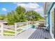 Outdoor deck area providing beautiful views of the pool, mature trees, and neighborhood scenery at 1046 Blackwood St, Altamonte Springs, FL 32701
