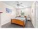 Bright and inviting bedroom featuring neutral walls, plush carpet, and a wooden bed frame at 1046 Blackwood St, Altamonte Springs, FL 32701