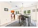 Eat in kitchen area with backyard views, a modern chandelier, and a breakfast bar at 1046 Blackwood St, Altamonte Springs, FL 32701