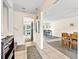 Open-concept hallway showcasing tile flooring and seamless transition into the dining and living areas at 1046 Blackwood St, Altamonte Springs, FL 32701