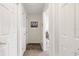Upstairs hallway with carpet and closet doors at 1046 Blackwood St, Altamonte Springs, FL 32701