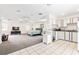Spacious living area showcasing an open layout with bedroom and kitchen, modern fixtures, and lots of natural light at 1046 Blackwood St, Altamonte Springs, FL 32701