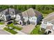 Beautiful home with lush landscaping and a stylish gray exterior viewed from above at 10626 Bonne Chance Dr, Orlando, FL 32832